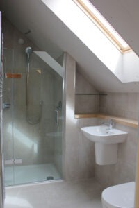 Shower cubicle in wooden log home 2
